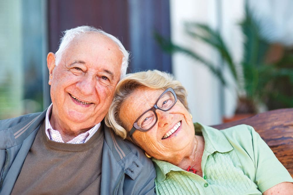 Older Adult Couple Enjoying the Charter Senior Living Lifestyle Older Adult Couple Enjoying the Charter Senior Living Lifestyle